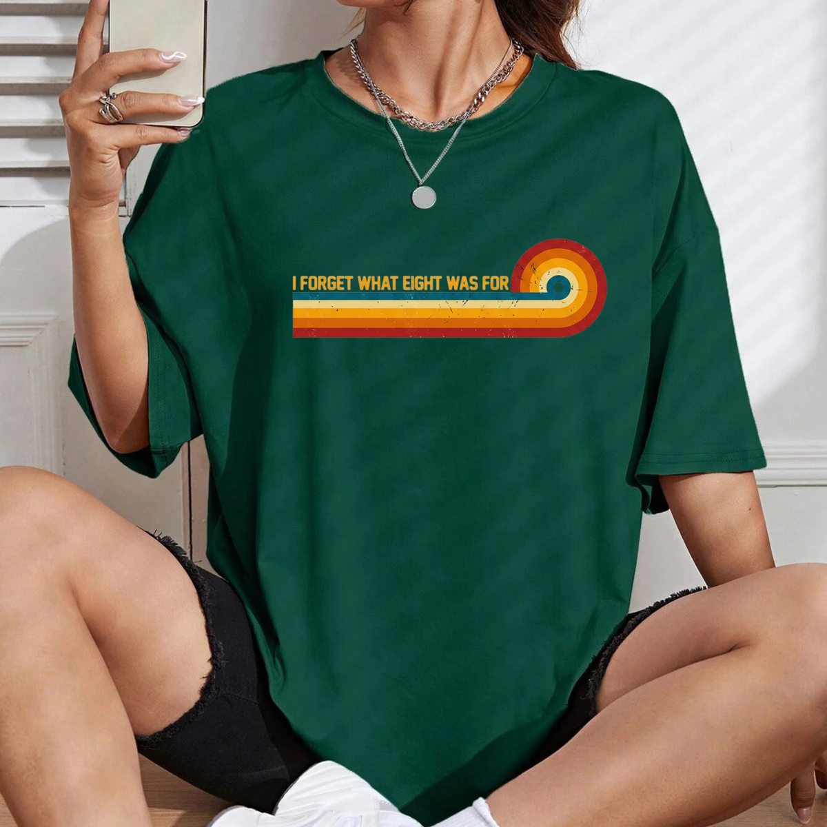 Front view of the eighties anthem callback tee displaying retro rainbow stripes and 80s music humor typography across the chest of a cotton shirt. - dogmomhat