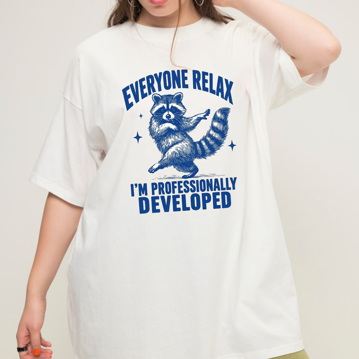 Front view of the trash panda pedagogy tee displaying funny raccoon professionally developed teacher graphic artwork across the chest of a Comfort Colors shirt. - dogmomhat
