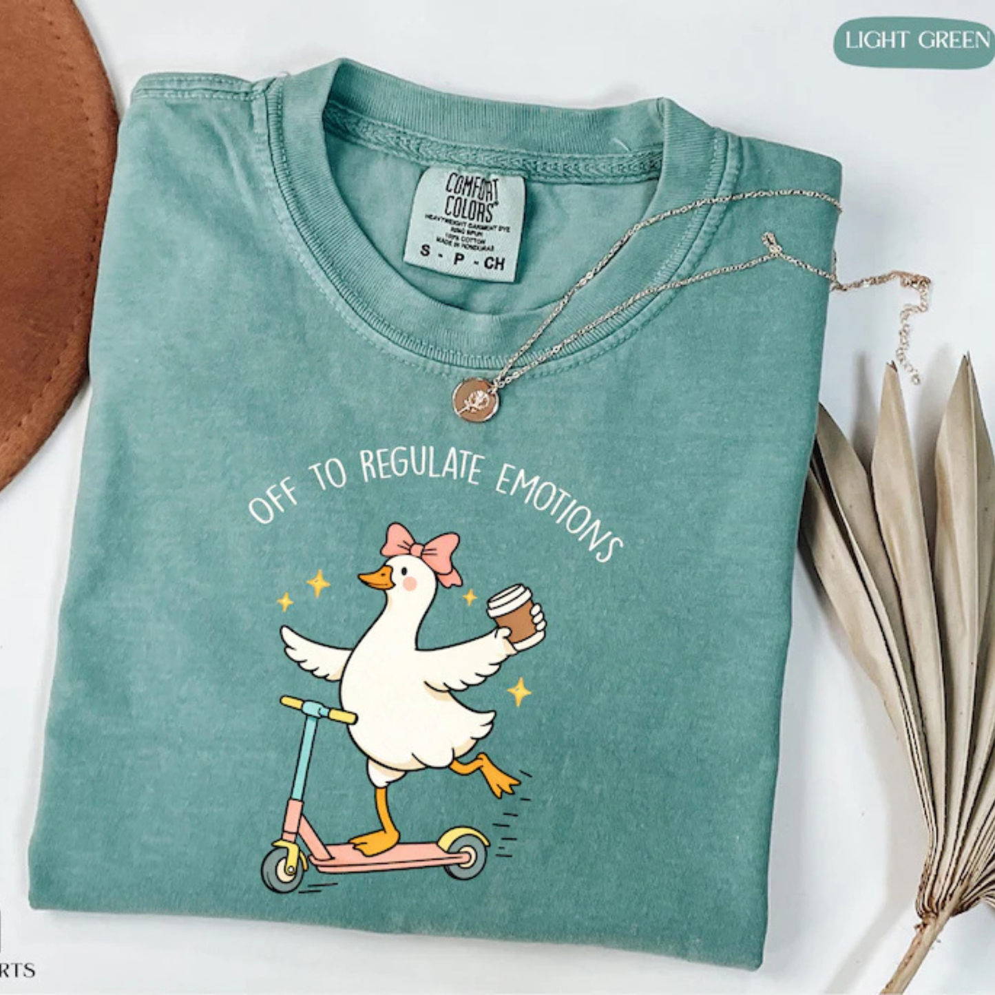 Front view of the Off To Regulate Emotions Silly Goose T-Shirt featuring the retro goose graphic and comfortable unisex classic fit - Hiya Mart