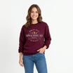 Front view of the festive friction crewneck displaying aesthetic Gingerbread Bakery holiday graphic artwork across the chest of a soft fleece sweatshirt. - dogmmhat
