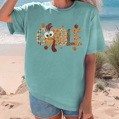 Front view of the festive friction tee displaying retro minimalist Gobble Thanksgiving graphic artwork across the chest of a garment-dyed shirt. - dogmomhat
