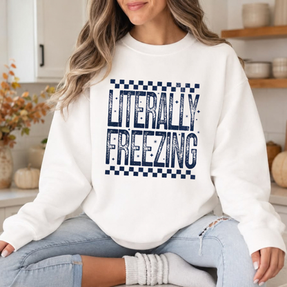 Front view of the literally freezing crewneck displaying sarcastic 'Literally Freezing' graphic typography across the chest of a soft fleece sweatshirt. - dogmomhat
